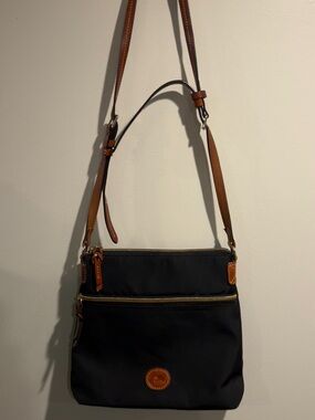 Dooney & Bourke Black Exterior with Red Interior and Brown Trim Crossbody